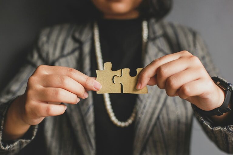 Hand Connecting Puzzle Piece